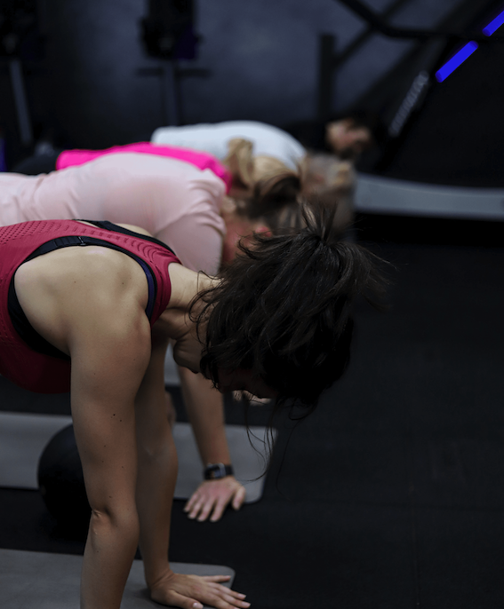 A group of ladies attending ladies fitness class in a gym in amersham